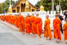 Laos monks goes begging for alms