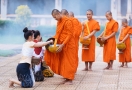 The monk went begging for alms in Luang Prabang