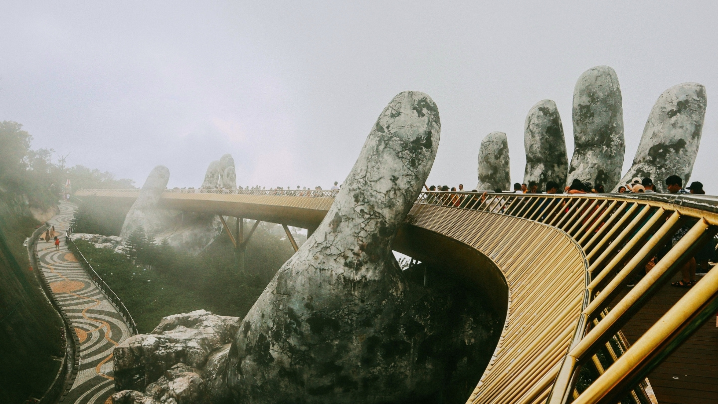Mist drifting around the giant hands of the Golden Bridge
