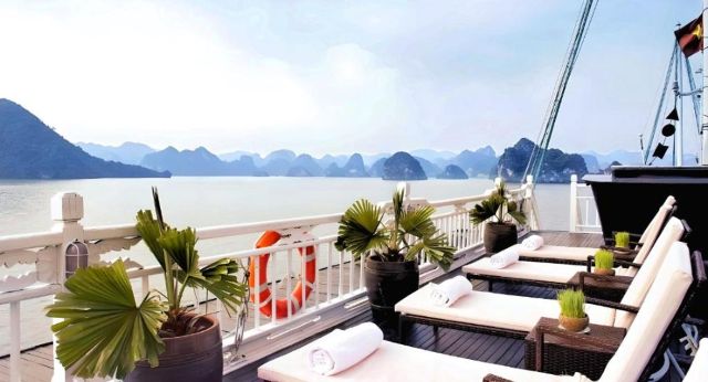 Admire Halong bays beauty on sunbeds