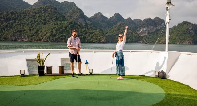 Playing Mini Golf on sundeck