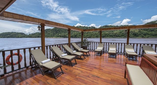 Admire panoramic view of mekong from sundeck