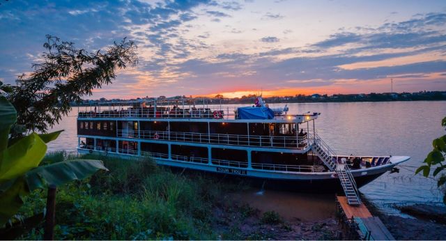Explore Mekong River at night with Toum Tiou 2 boat