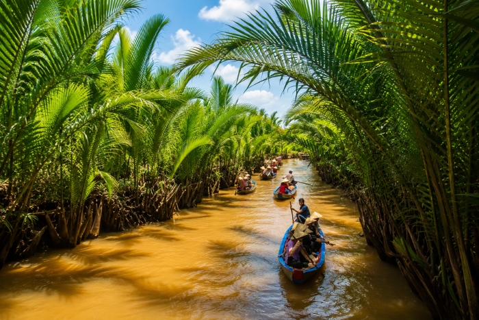 Boat ride through the coconut groves of the Mekong in Ben Tre