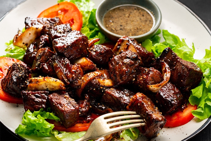 Lok Lak – juicy stir-fried beef with pepper-lime sauce