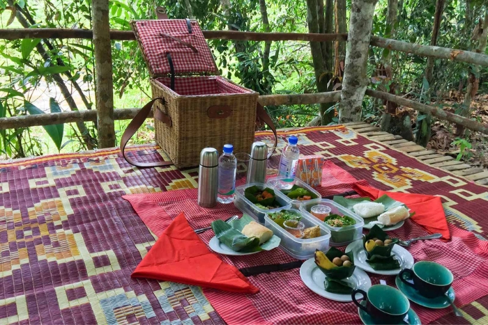 Have lunch by the river during my nature trek in Cambodia in April