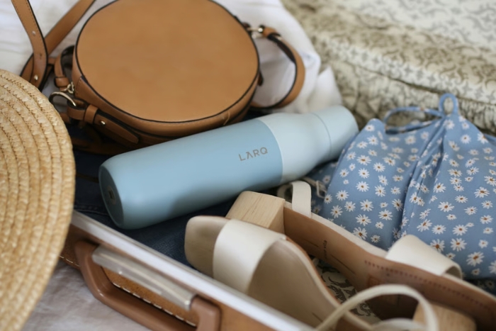 Bring reusable water bottles to stay hydrated throughout your family trip
