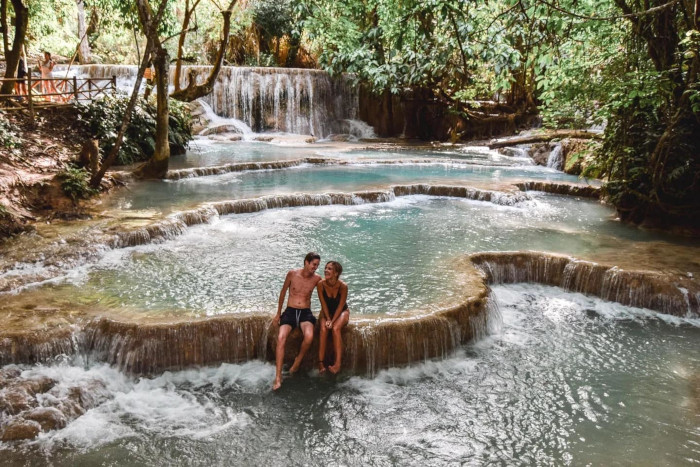 Marveling at the stunning turquoise pools of Kuang Si Waterfall, a highlight of my Luang Prabang itinerary 2 days