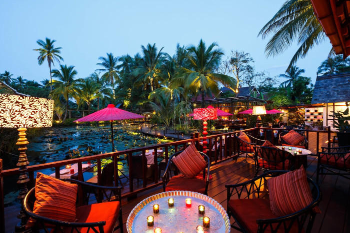 Enjoying a romantic meal, the perfect end to a day in our Luang Prabang Itinerary 5 days