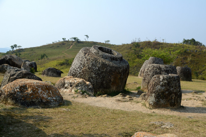 Explore the Plain of Jars, a fascinating Laos must-see that unveils ancient mysteries and stunning landscapes