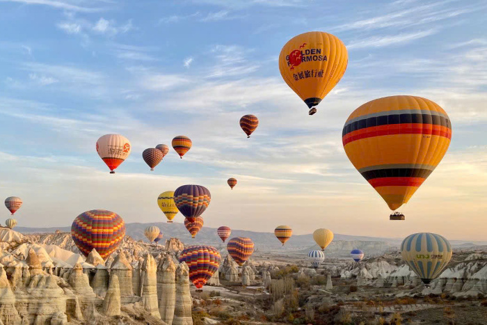 Soar above the stunning landscapes with a hot air balloon ride