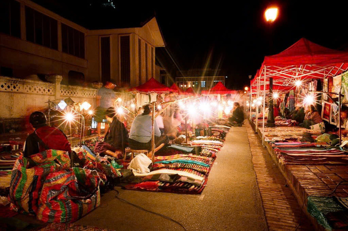 Stroll through the vibrant Luang Prabang Night Market during your Laos itinerary 5 days