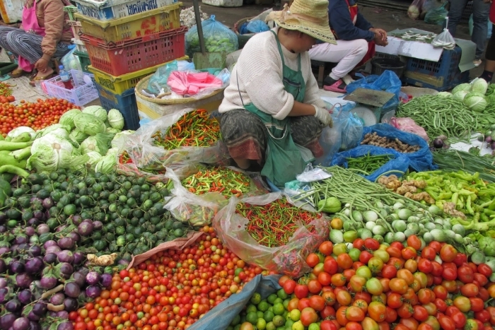 When to visit local markets in Laos?