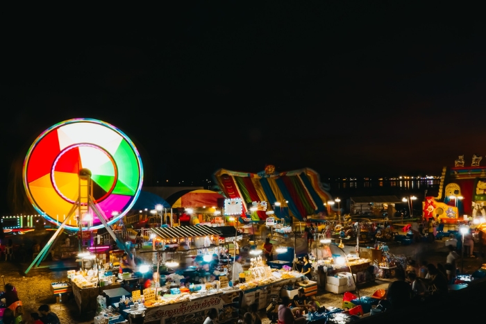 Mekong riverside‎ and the night market‎ for the end of the day during your family trip in central Laos