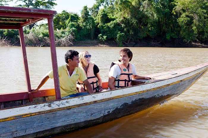 Take a boat tour to watch the sunset at Si Phan Don islands