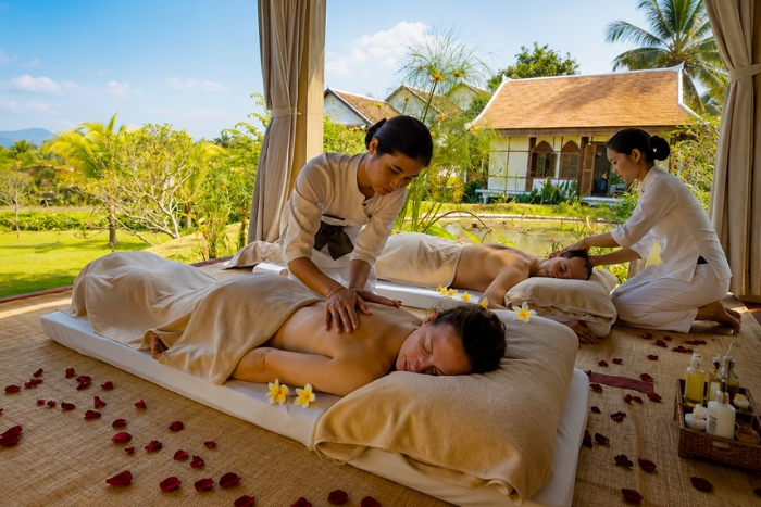 Enjoy a traditional Lao massage during a trip to Laos