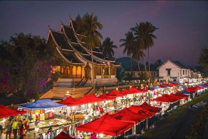 Immerse yourself in the lively and bustling atmosphere of the Luang Prabang night market