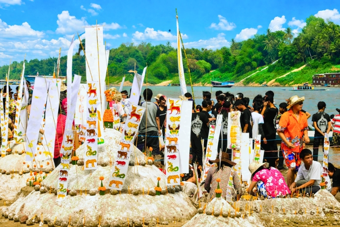 Tradition of sand stupas along the Mekong River - A gentle immersion into Lao traditions