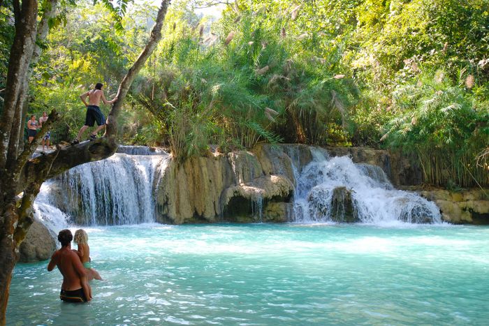 Swimming at Kuang Si waterfalls in Luang Prabang, Laos