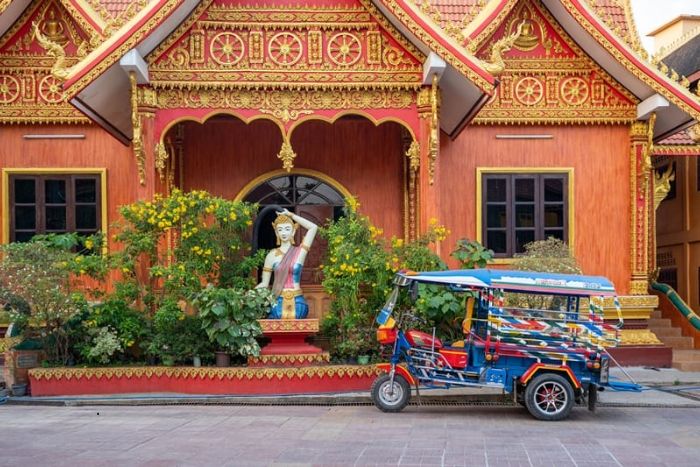 Explore Vientiane by tuk-tuk during your travel to Laos with a baby