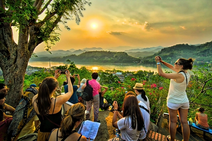 Luang Prabang bathed in light from the top of Mount Phou Si