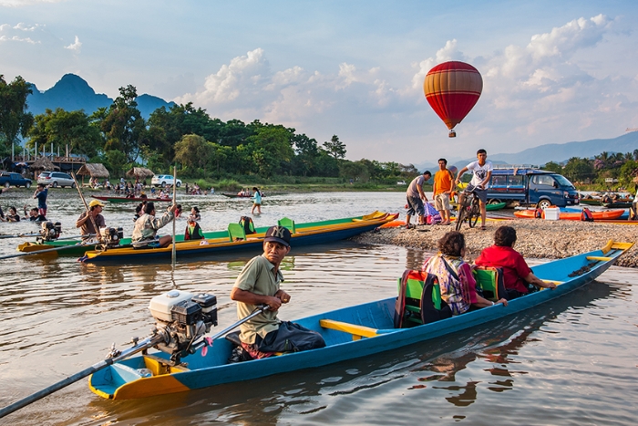 Why choose to travel to Vang Vieng in november?