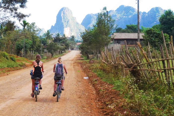Cycling through village, best things to do in Vang Vieng