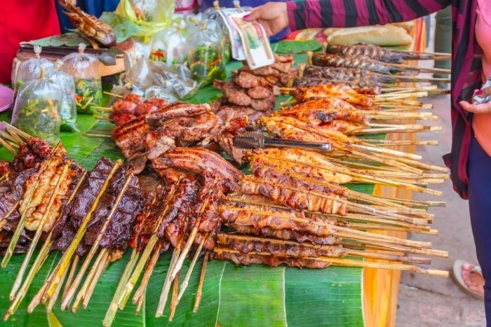 Street stalls offer a wide variety of local dishes to discover