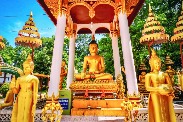 Travel to Laos respectfully around sacred statues