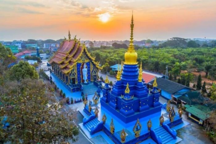 Visit the Blue Temple, Wat Rong Suea Ten, during your 10-day trip to Thailand