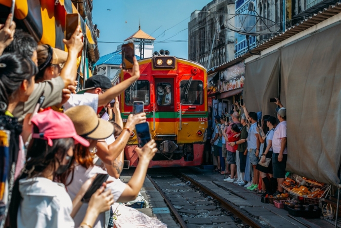 Visiting Mae Klong Railway Market in Thailand is a must do !