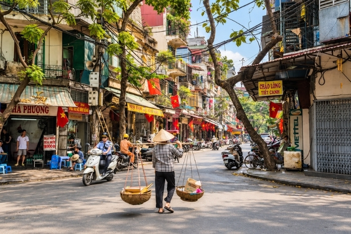 Between narrow streets and local life in Hanoi Old Quarter