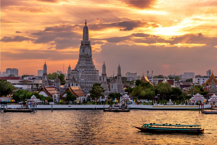 Wat Arun seen from the river, a must-stop in Bangkok
