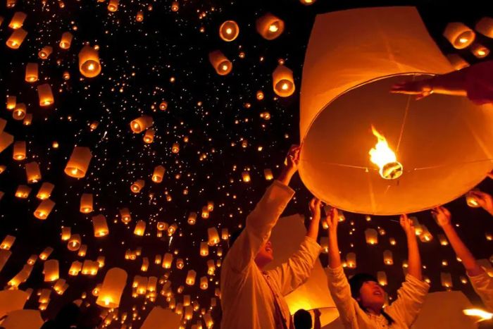 The Yi Peng Festival lights up the sky over Chiang Mai with thousands of floating lanterns, creating a magical and unforgettable atmosphere
