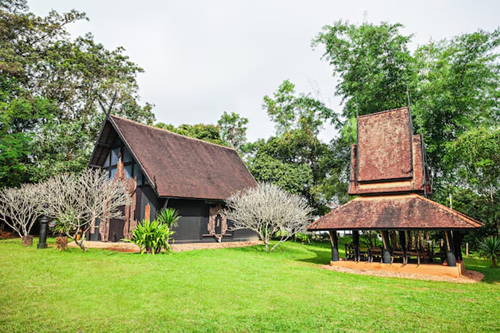 Stroll through the tranquil natural environment at Baan Dam Museum