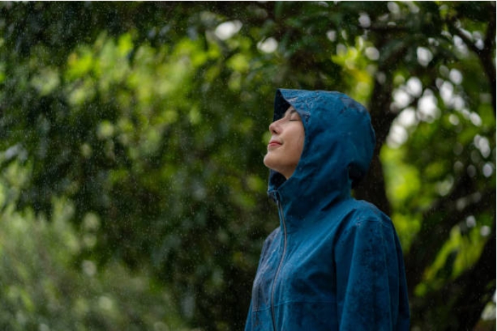 What precautions should be taken when visiting Kanchanaburi in the rain?