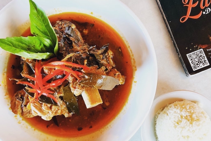 Moo Chamuang, a tasty choice for what to eat in Kanchanaburi