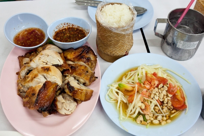 Looking for specialties in Kanchanaburi? Kai Yang & Som Tam is a great dish