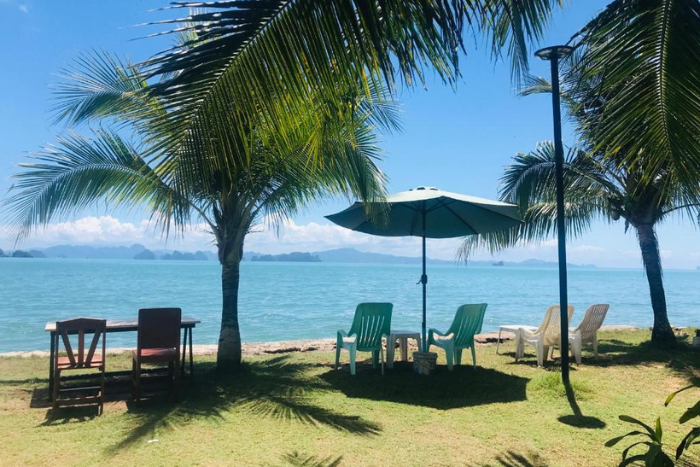 The poetic beach view from the garden of Koh Yao Yai Sea Breeze House, one of the best homestays in Koh Yao Yai for sea lovers