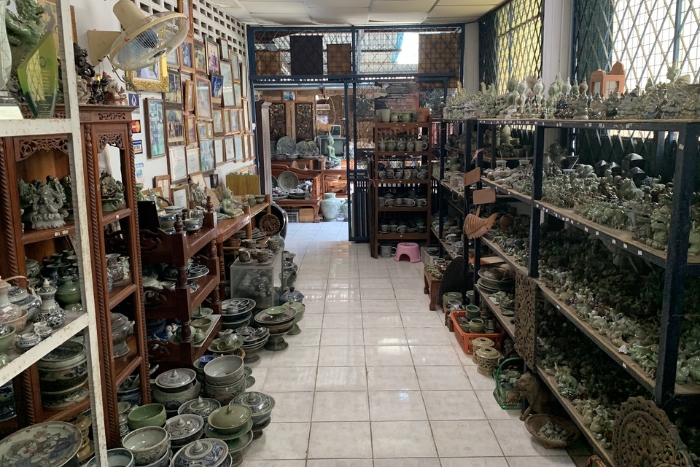 Traditional pottery at the village of Sangkhalok in Northern Thailand with kids