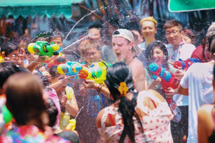Energetic water battles during the Wan Lai festival