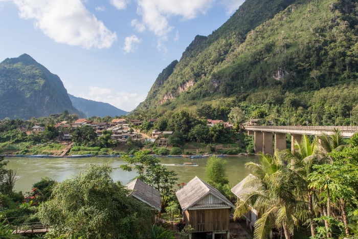 Peaceful Nong Khiaw is a hidden gem on any Thailand Laos 2 week itinerary adventure