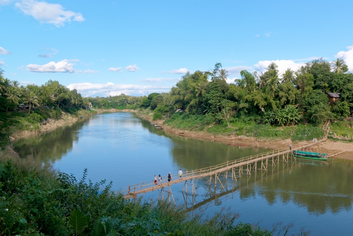 Peaceful moment by Nam Khan River during our Thailand Laos 2 week itinerary and cultural journey