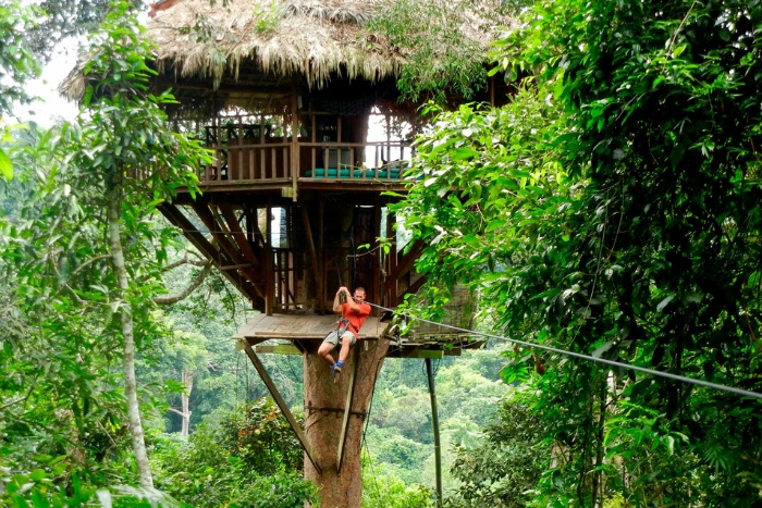 Zip lining in Houayxay was a thrilling highlight of our Thailand Laos 2 week itinerary through jungle and treetops.