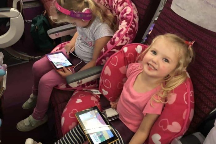You may consider letting your children bring electronic devices while traveling