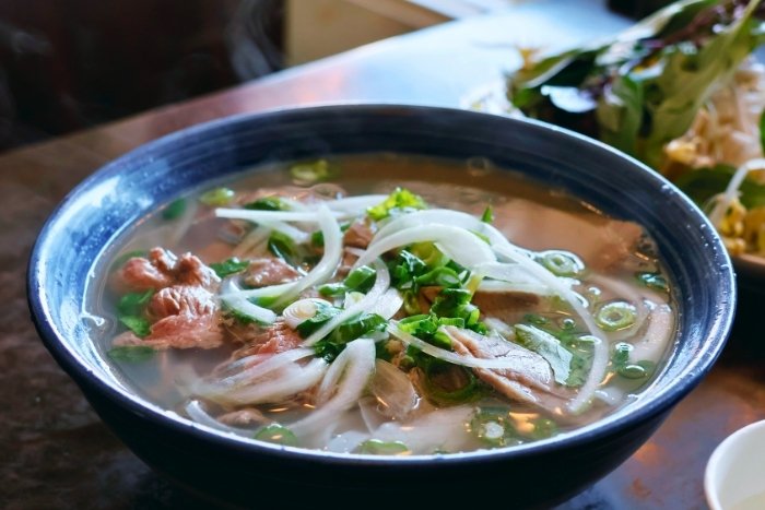 Tasting pho during Vietnam in November