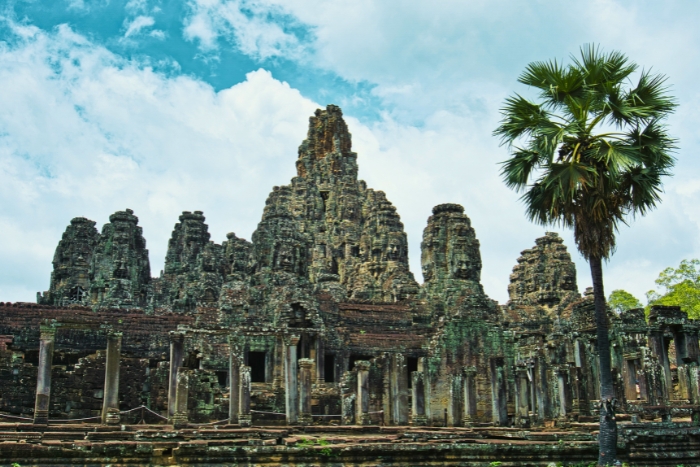 Ancient stone faces at Bayon Temple in Cambodia