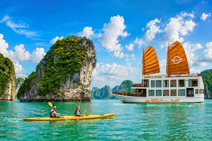 Kayaking through the spectacular landscapes of Halong Bay