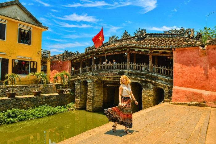 Strolling through the streets of Hoi An with the best luxury Vietnam Cambodia tour