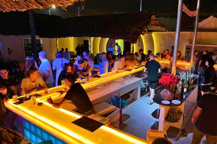 Nightlife magic with music, fire, and ocean vibes